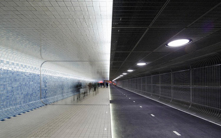 1/9 A new tunnel in Amsterdam connects people to the main railway station and to the port, where they can continue by ferry.